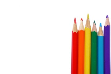 Color pencils in rainbow  color on white background. Concept lgbt community. Celebration in pride month. June 2021