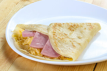 Pancake with ham and cheese