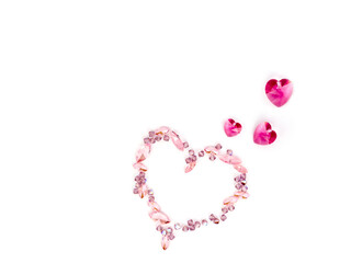 Romantic pink crystal heart on white background. Valentine concept. Holiday wedding. Abstract crystal for celebration design.