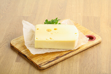 Maasdam cheese over the board