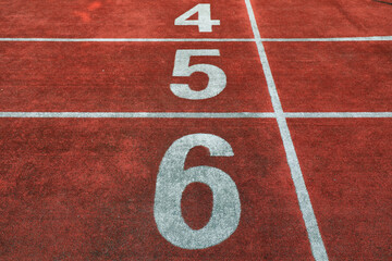 The red plastic track is on the playground