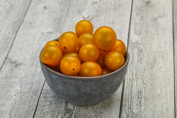 Fresh yellow cherry tomato heap