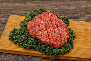 Raw beef burger cutlet for cooking