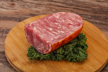 Beef ham piece over board