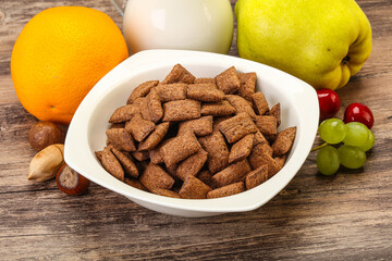 Breakfast with corn chokolate pads and milk