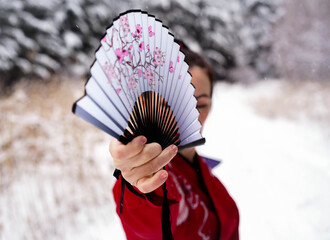 person with a fan