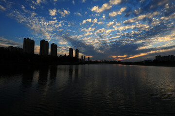 Fototapeta na wymiar Evening scenery of waterfront city, North China