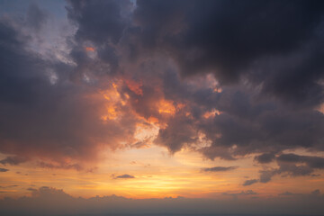 Colourful and dramatic cloud sky at sunset after a thunderstorm