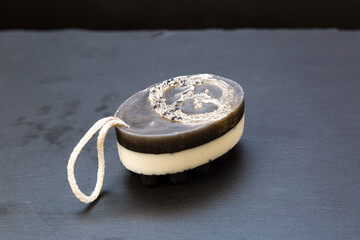Handmade massage soap with cosmetic clay, natural loofah washcloth.,