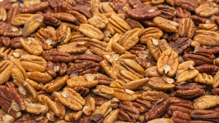 Tasty pecan-nut background. Top view.