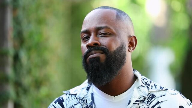 Skeptical black man, uncertain person having doubt skeptic emotion