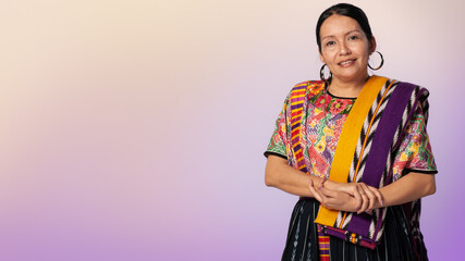 Portrait of an indigenous woman looking at the camera.