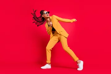 Sierkussen Full length photo of funny lady dance wear eyewear yellow suit isolated on vivid red color background © deagreez