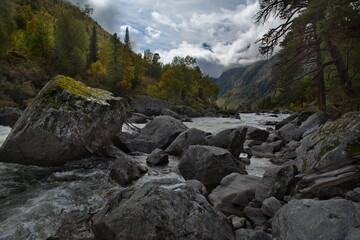 Russia. South Of Western Siberia, Altai Mountains. Early autumn on the mountain river Chulcha (a tributary of the Chulyshman River) near the Uchar waterfall.