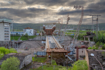 Railway turntable of Ship lift of Krasnoyarsk hydroelectric power station on the Yenisei River. Industrial background