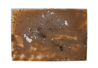 Glass doused with mud isolated on white background
