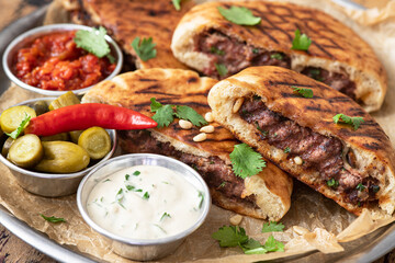 Arayes- pita bread filled with a mixture of minced meat with different spices	