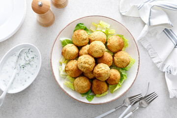 Falafel with greek yogurt sauce tzatziki, mediterranean cuisine