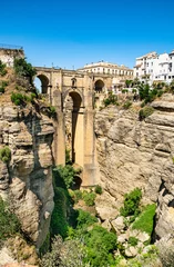 Photo sur Plexiglas Ronda Pont Neuf a view of the famous bridge crossing in the Spanish town of Ronda in Andalucía, Spain 