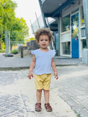 Beautiful little toddler girl outside