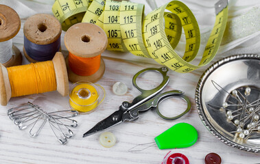 Threads, needles and sewing items.