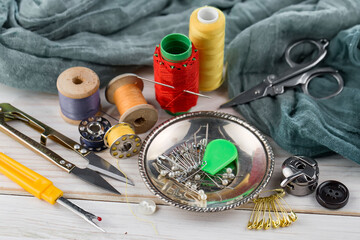Threads, needles and sewing items.