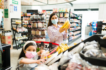 Happy mom and daughter enjoying shopping