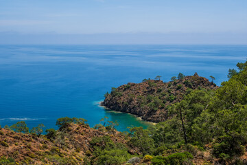 Naklejka premium Picturesque landscape of Maden Bay near Cirali from lycian trail, Kemer, Antalya. May 2021, long exposure picture