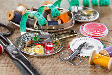 Fototapeta na wymiar Handicraft items, threads, sewing needles.