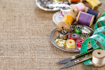 Fototapeta na wymiar Handicraft items, threads, sewing needles.