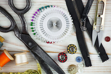 Threads, needles and sewing items.