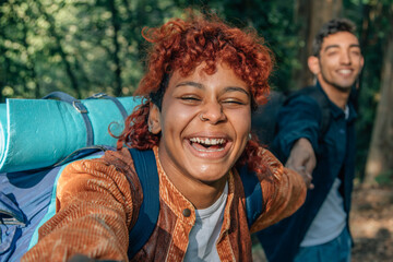 young multiethnic couple enjoying the trip or excursion
