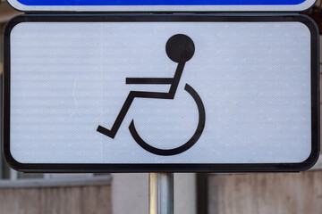 Disabled parking road sign. Background with copy space