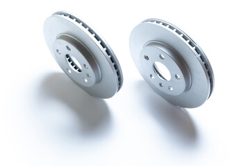 Sapre parts. Auto motor mechanic spare or automotive piece on white background. New metal car part. Repair and vehicle service with space for text.