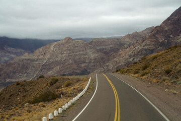 Road to Aconcagua. Traveling along the asphalt highway high in the mountains.	
