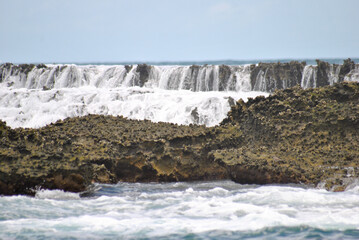 wave breaking on the rocks