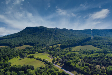 Fototapeta na wymiar Aerial view of Mountains in Virginia at of summer green trees forest in Daleville town