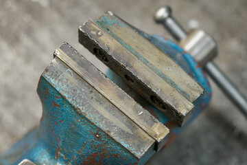 Used jaws of a small vice with traces of welding.