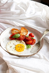 egg with tomato and basil