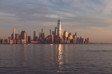 Beautiful Lower Manhattan Skyline Shining in the Sun during a Sunset in New York City along the Hudson River