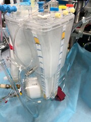 Venous reservoir and oxygenator connected with heart lung machine by tubing circuit for...