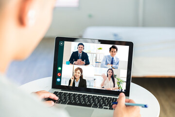 Fototapeta na wymiar Business people use laptops for web meetings at home, discuss work and schedules with colleagues through webcams