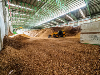 Wood chipper was kept in biomass power plant by apply to fuel of burner.