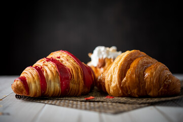 Croissant bakery on white wooden table
