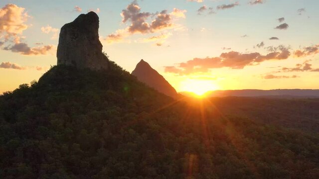 Aerial view of Mt Coonowrin (fg) & Mt Beerwah, Glasshouse Mountains, Sunshine Coast, Queensland, Australia.