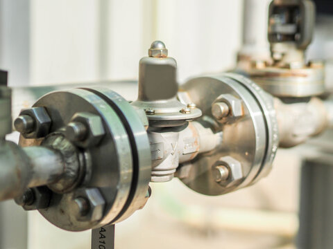 Pressure regulator for control pressure in water line at power plant.