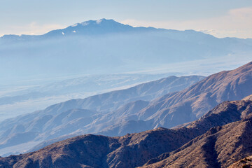 Top of the mountain at Joshua Tree National Park over looking the rugged rock and valley in California USA