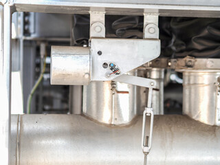 Spring hanger pipe support in power plant.