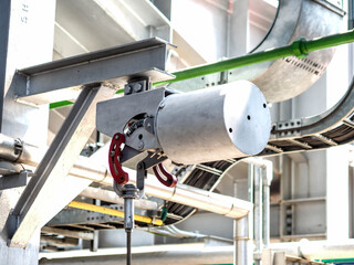 Spring hanger pipe support in power plant.