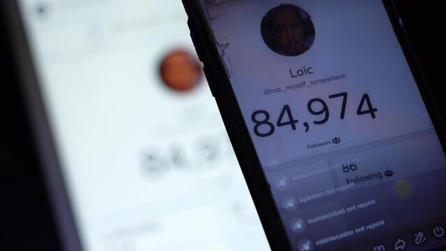 Social Media Influencer Increasing Numbers Of Followers. - close up - Tik Tok